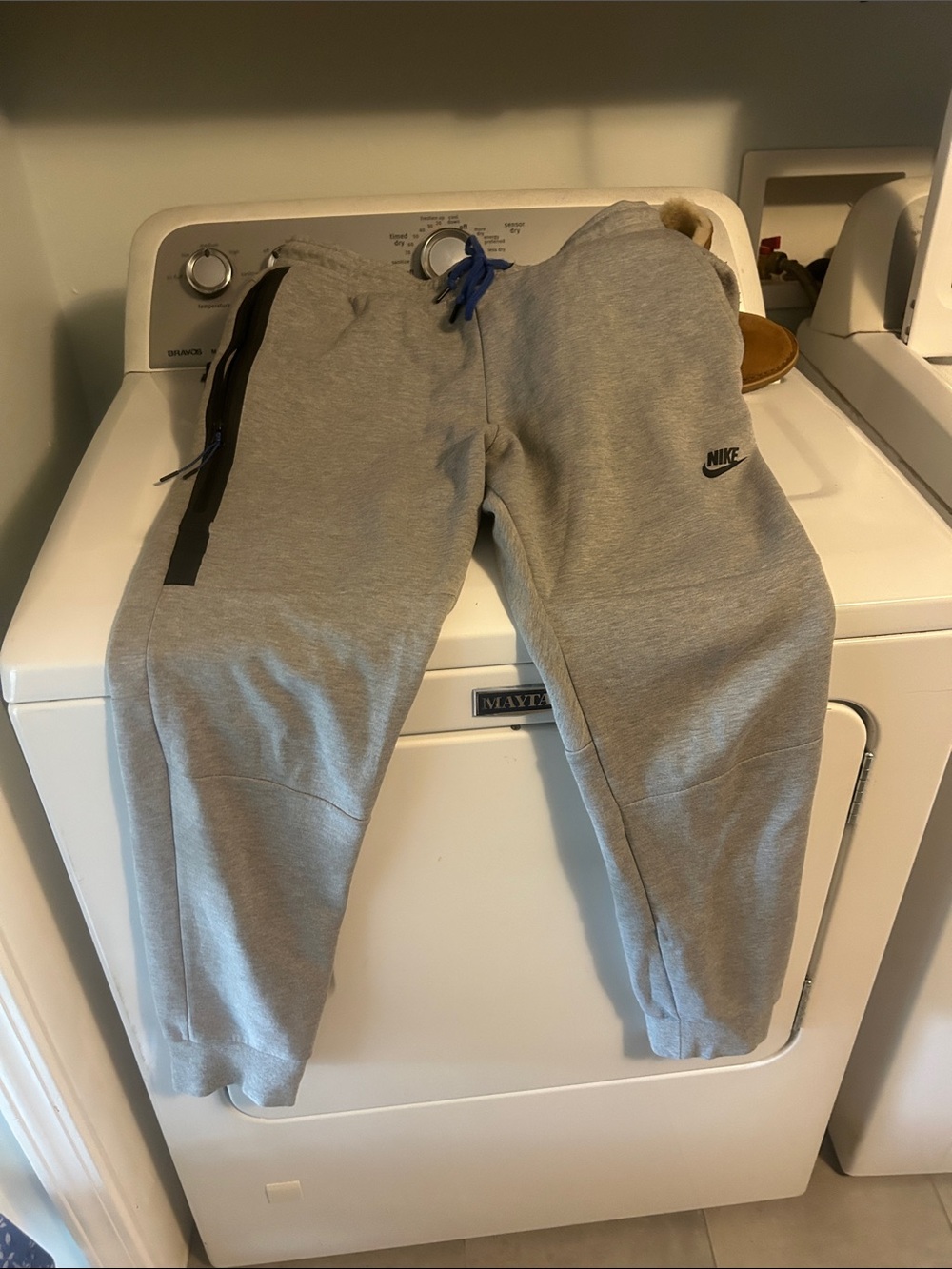 Nike Kids Gray Sweatpants with Black Zip and Blue Drawstring